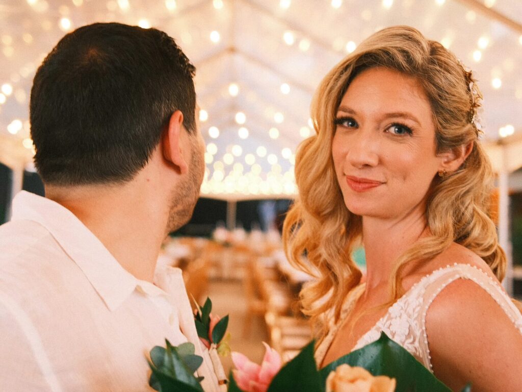 A bride wearing a simple bridal makeup look.